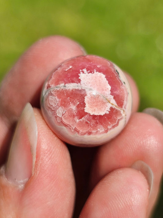 Petite sphère de Rhodochrosite RH12