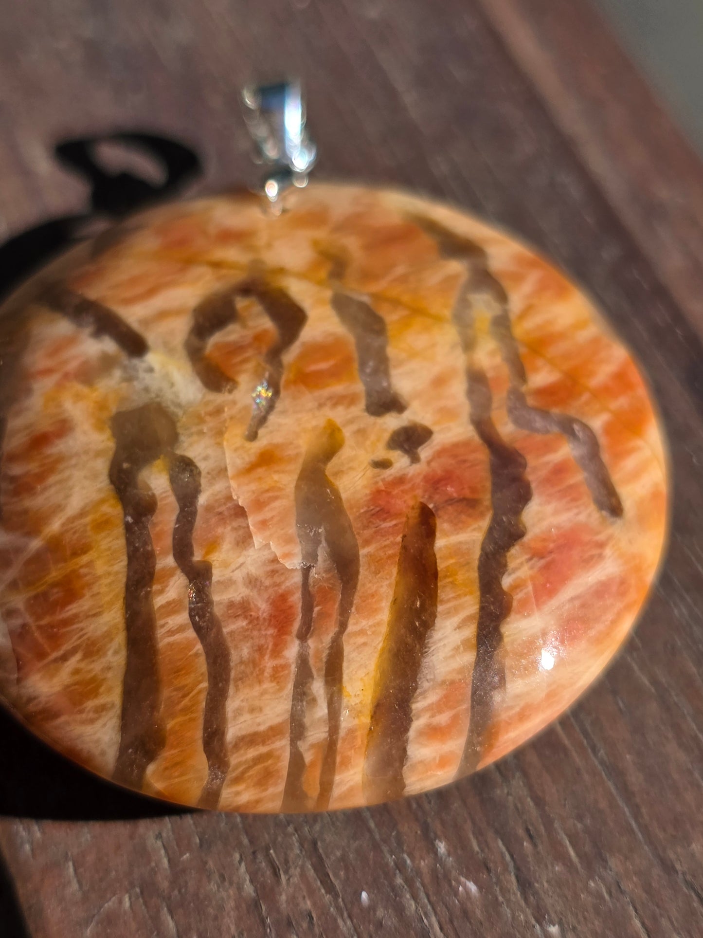 Pendentif pierre de lune orange et graphite