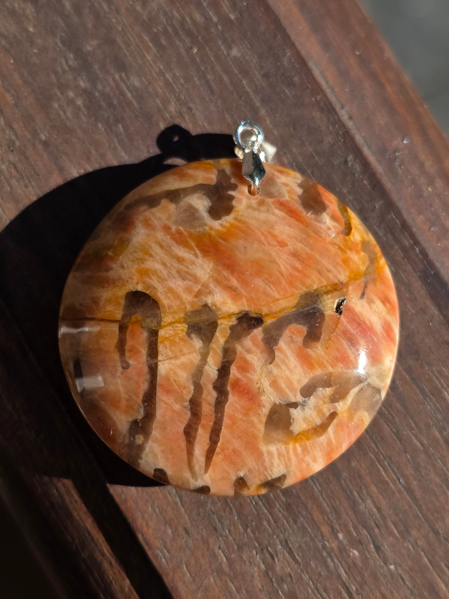 Pendentif pierre de lune orange et graphite