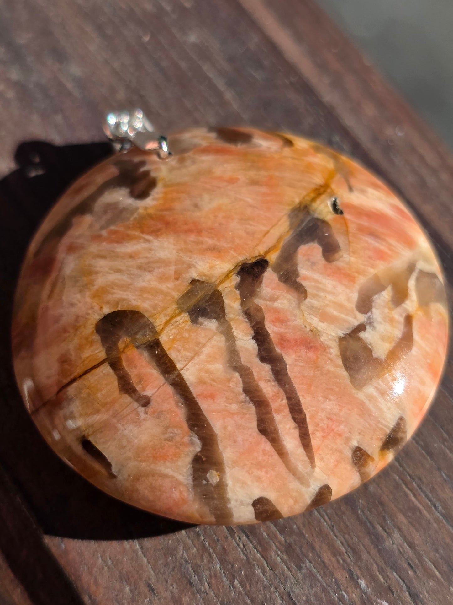 Pendentif pierre de lune orange et graphite