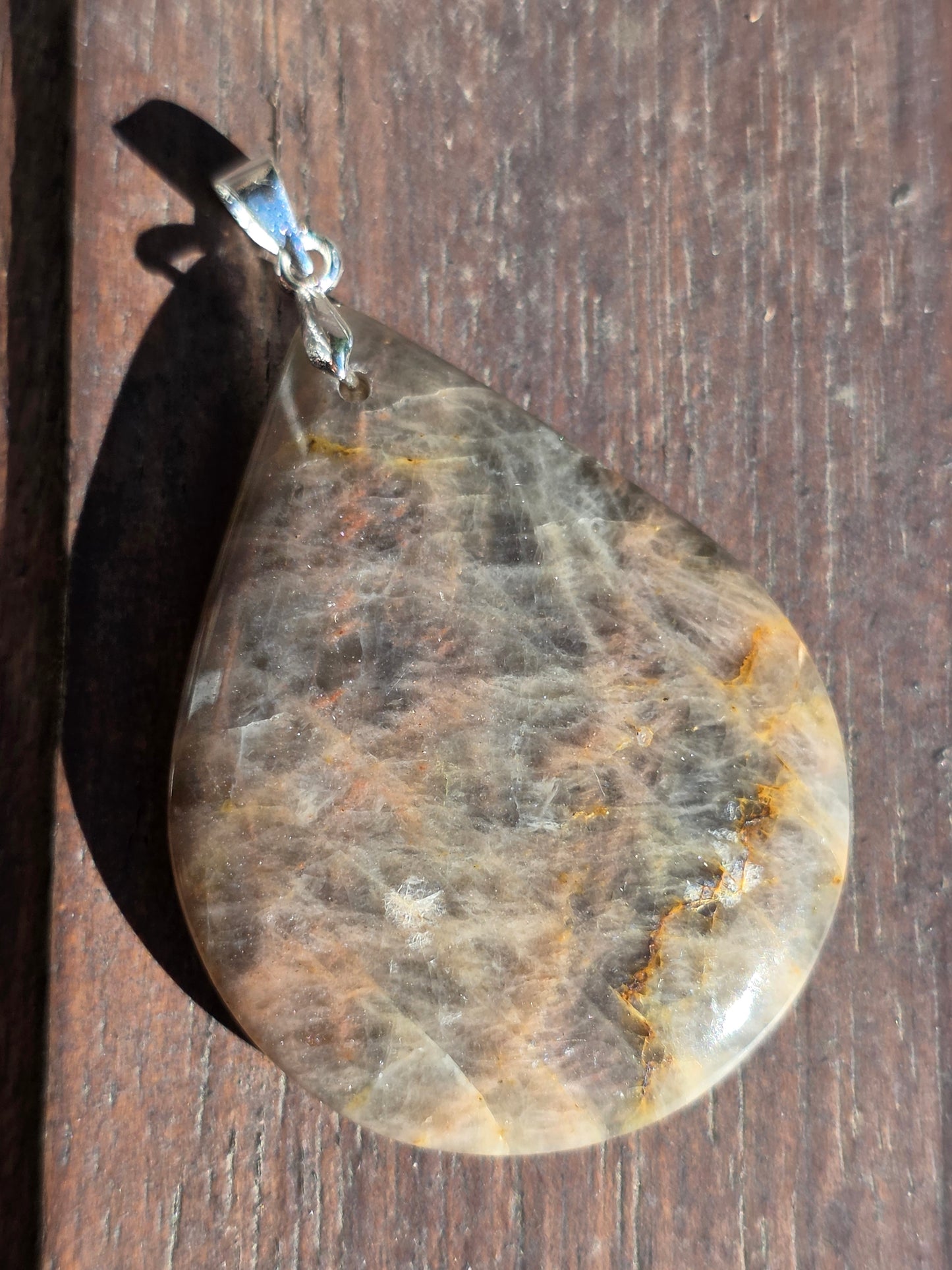 Pendentif pierre de lune noire et orange
