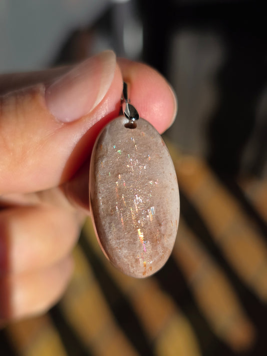 Pendentif pierre de soleil "pluie de météorites"