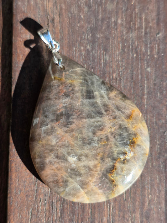 Pendentif pierre de lune noire et orange