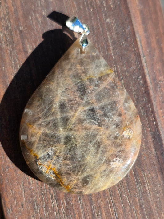 Pendentif pierre de lune noire et orange