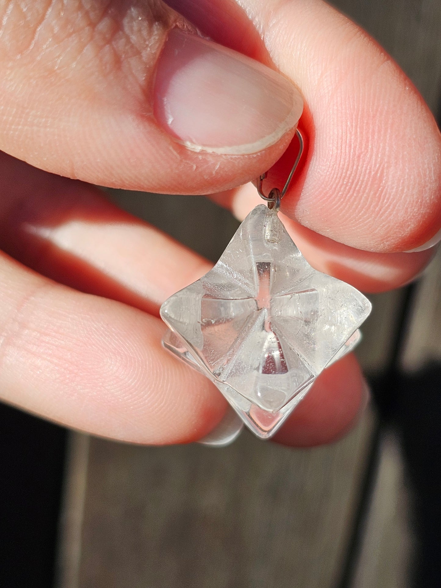 Pendentif merkaba en cristal de roche