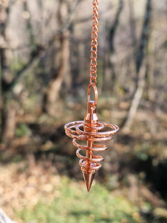 Pendule spirale en cuivre