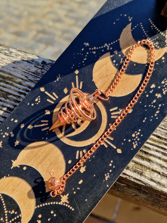 Pendule spirale en cuivre